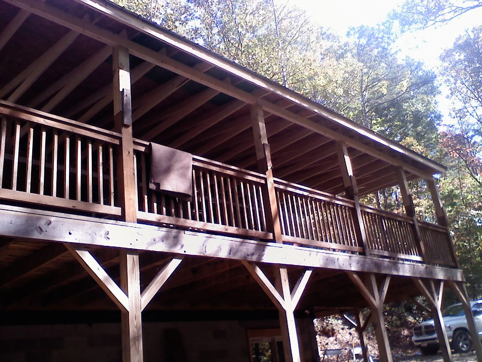 Timber framing under a new elevated porch and deck — Roof Leak Repair in Hayes by Roofing Brothers